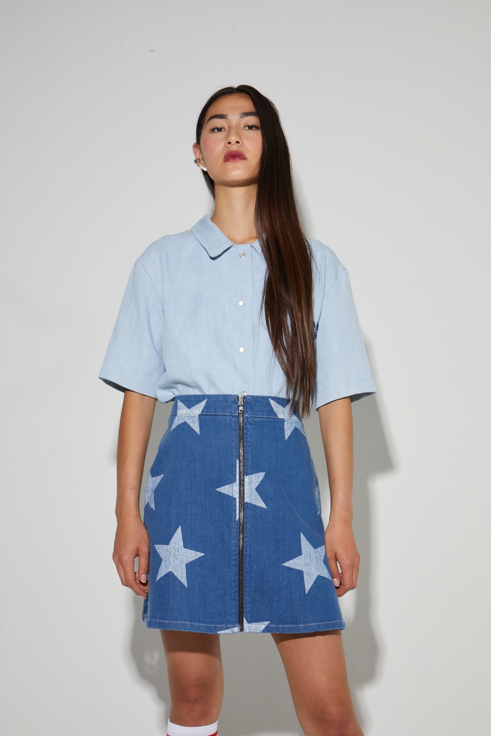 Stella-minirok, in denimstijl met blauwe sterrenprint, gemaakt in Italië