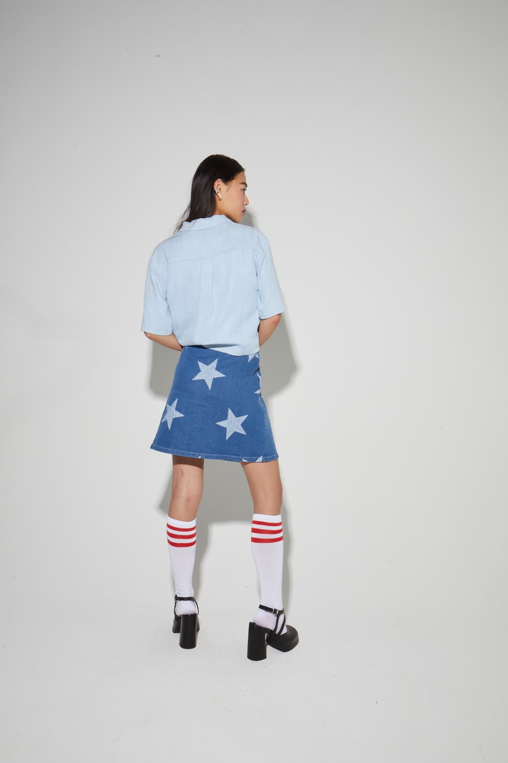 Stella-minirok, in denimstijl met blauwe sterrenprint, gemaakt in Italië
