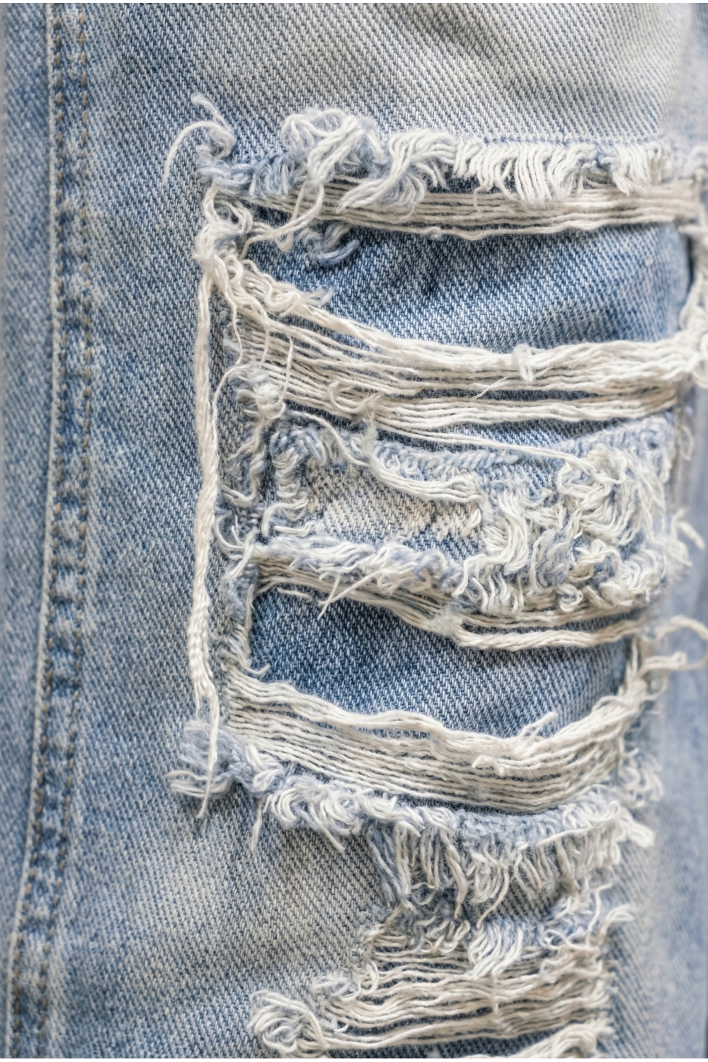 Light blue distressed denim made in Portugal