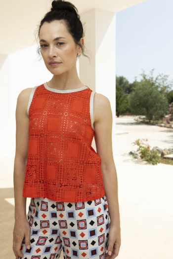 The Diego top in orange-red...